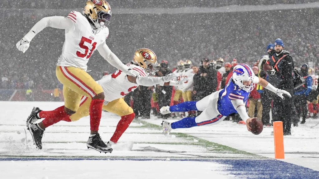 Josh Allen diving for a touchdown